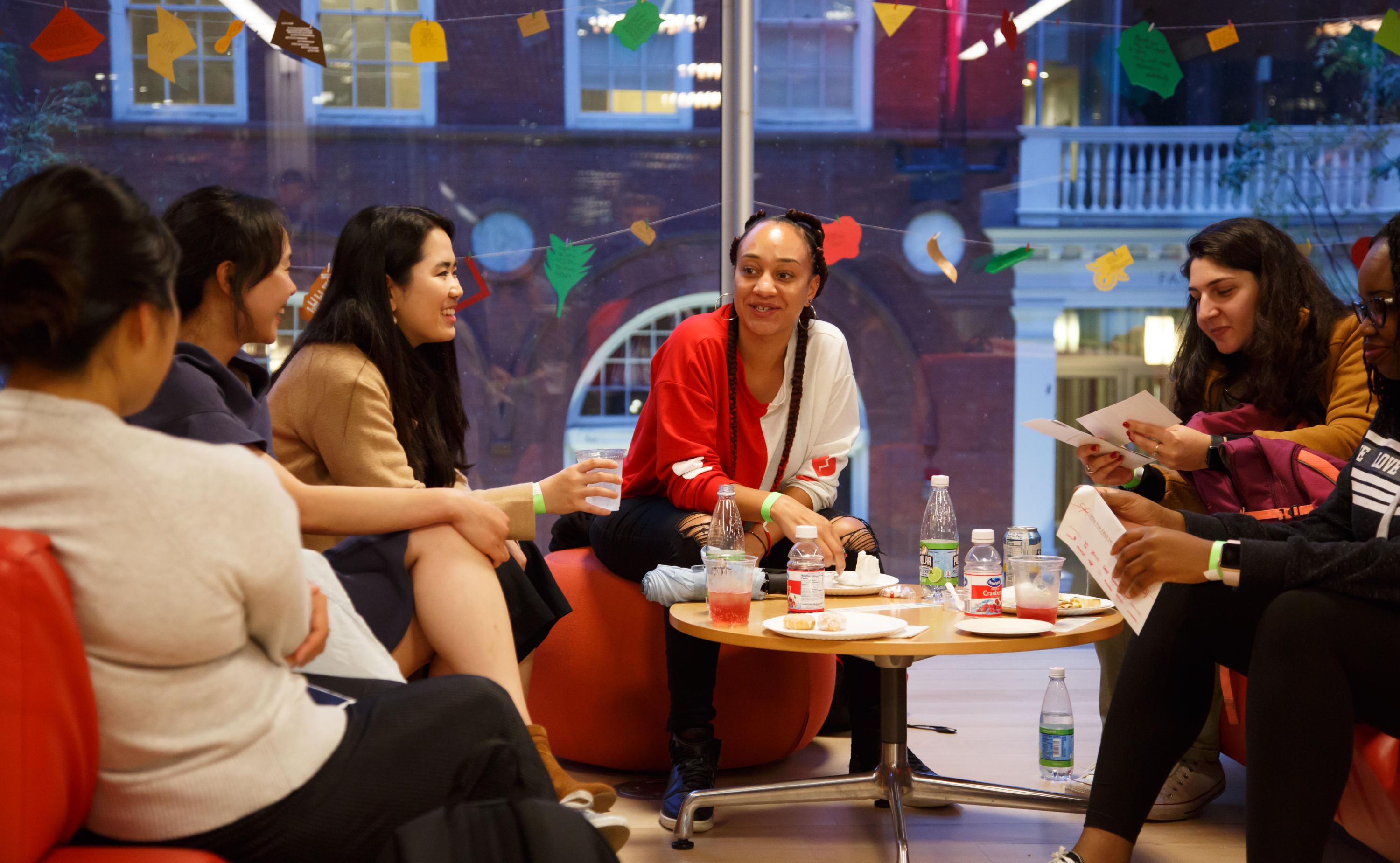 A group of Harvard graduate students and affiliates connecting at a GCP event
