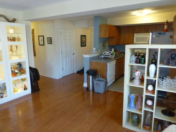 open concept living and dining area with hard flooring