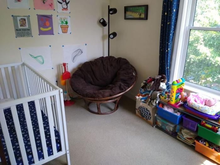 Secondary bedroom with carpeting