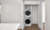 1 bedroom convertible unit with open laundry closet