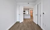 1 bedroom convertible unit living area facing kitchen